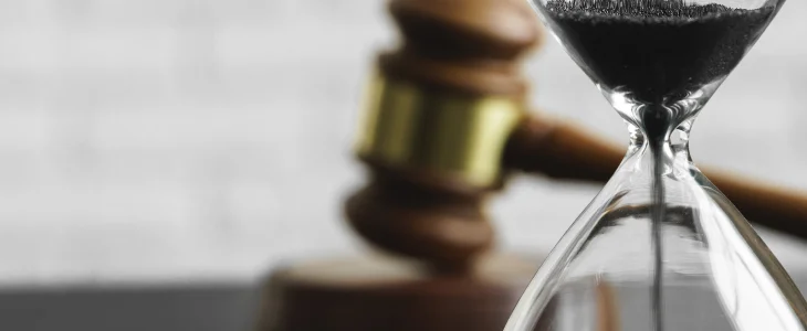 Time and gavel and mallet to represent wage and hour law