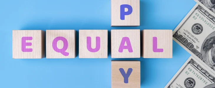 Equal pay written on wooden blocks