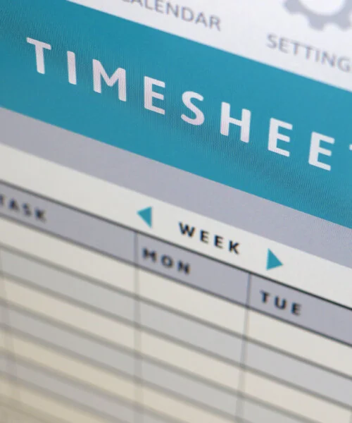 photo of generic digital designed time sheet which I designed on computer screen for tracking business trading hours